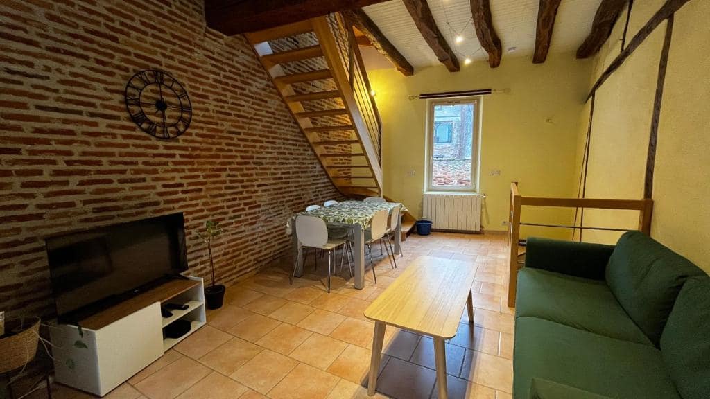 Chambre fleurie — © Le Gîte d'Eugénie